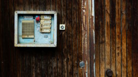 Intercom on wood paneling