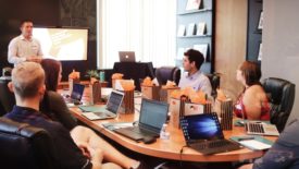 people working at conference table