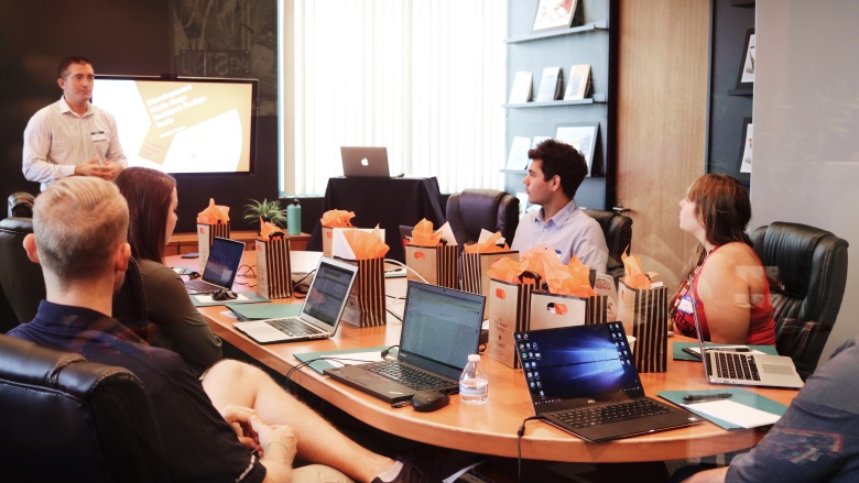 people working at conference table