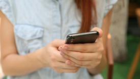 Woman holding a cellphone